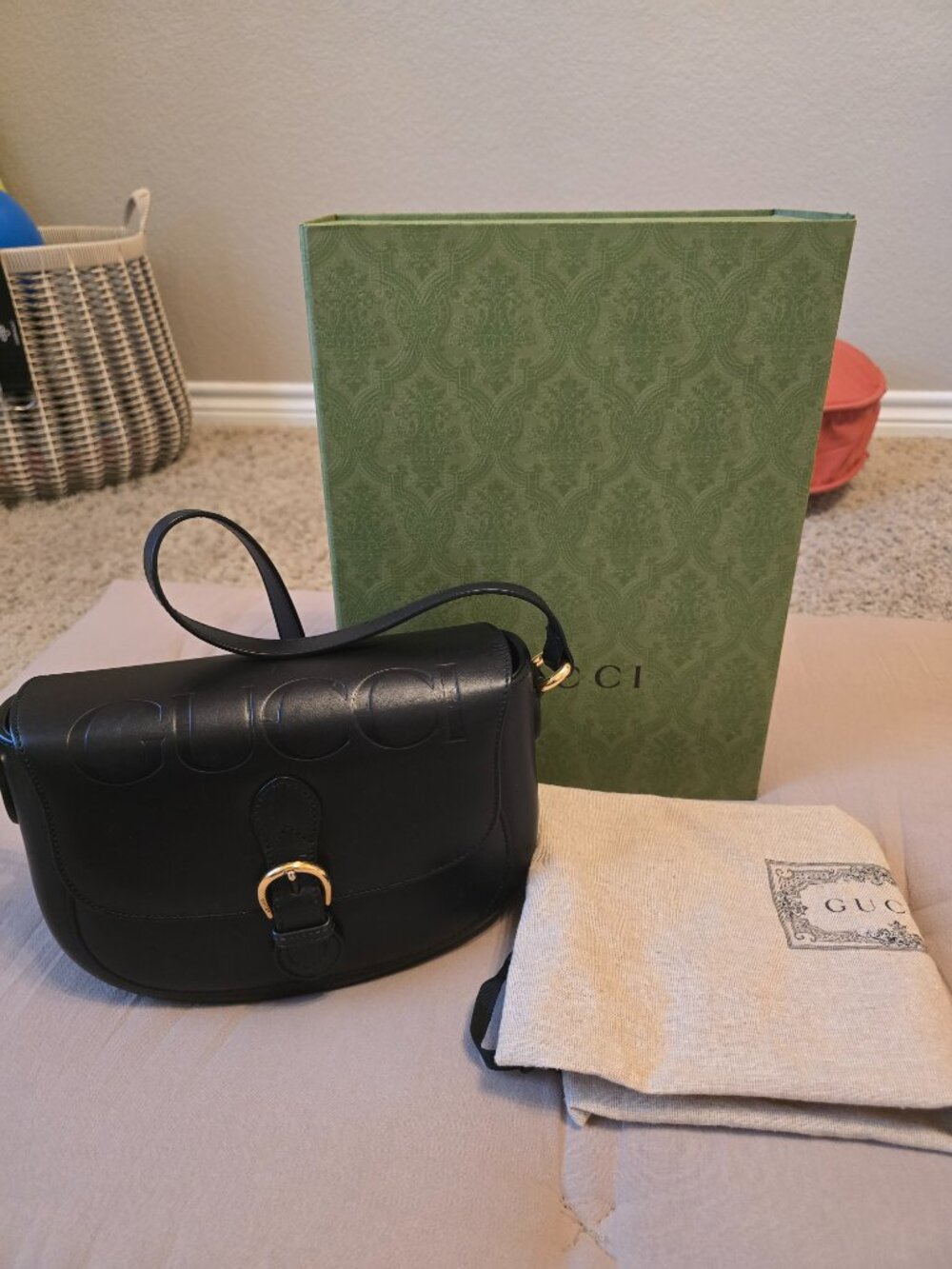 Gucci Embossed Logo Crossbody
